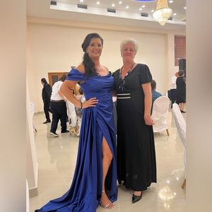 This beautiful dress was bought in Europe and worn once for a wedding